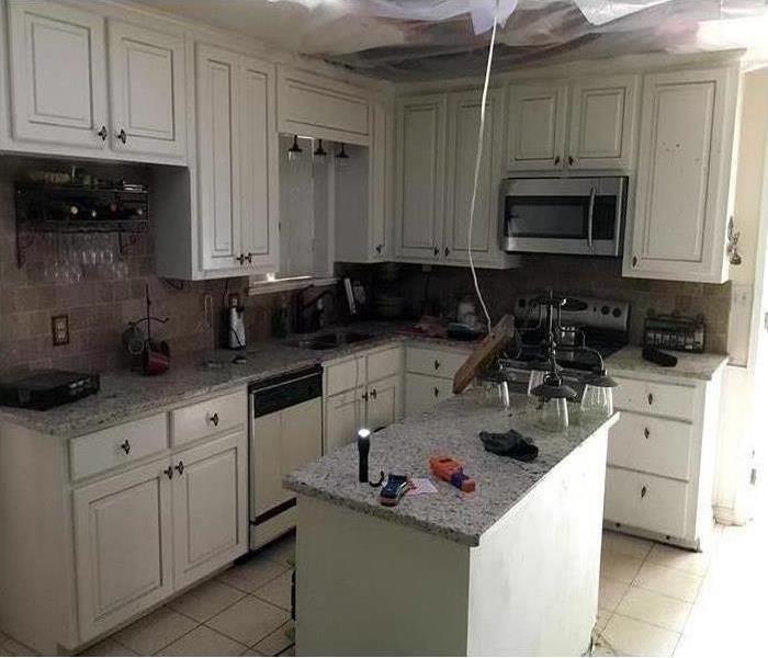 same kitchen repaired and as good as new