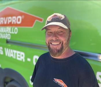 Portrait Of Jaison, in front of green truck